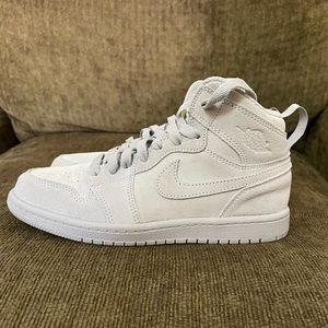 Kids grey Nike sneakers